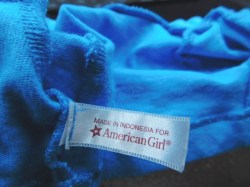 ag short blue knit zip jacket label